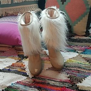 White furry boots by JLO